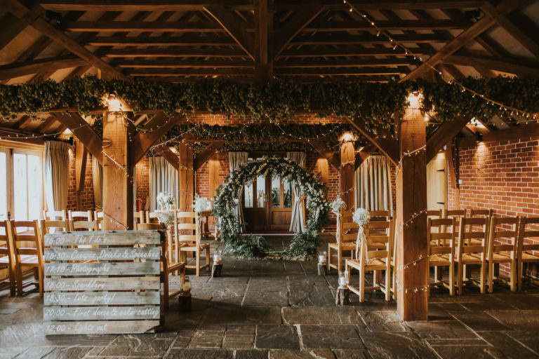 A small intimate wedding ceremony in The Ferry House Oak Barn