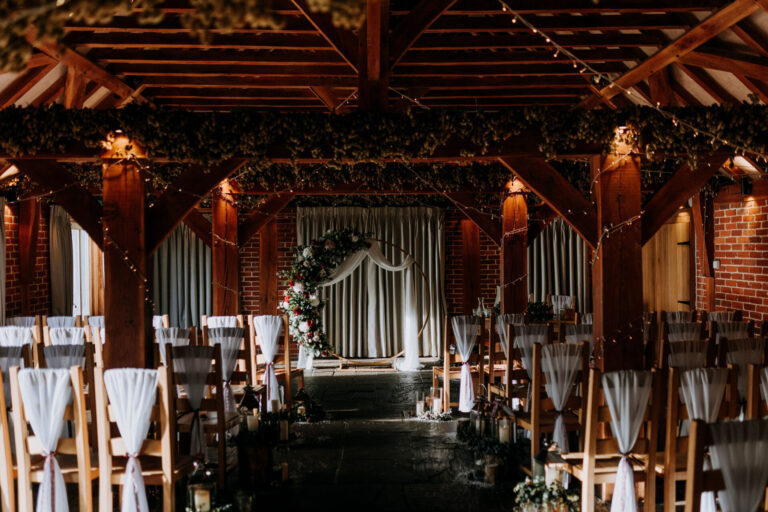 The Ferry House Kent barn dressed for a wedding ceremony.