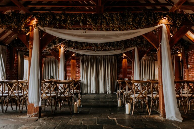 An intimate ceremony set up at The Ferry House barn wedding venue in Kent