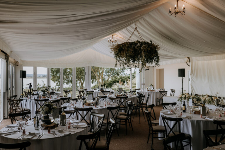 A wedding breakfast set up in the Event Suite at The Ferry House wedding venue in Kent.